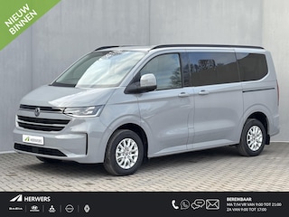 Volkswagen Transporter Caravelle 32 L1H1 Life 64 kWh Automaat / NIEUW/ Fabrieksgarantie tot 12-2027 / 8 Persoons / Stone Gray / Warmtepomp / Apple Carplay/Android Auto / Licht en zicht-pakket / Keyless entry / draadloze telefoonlader /