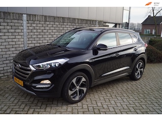 Hyundai Tucson 1.6 T-GDi Premium 4WD Autom Panodak Leder Stoel/Stuur en A Bankverw Navi Camera Xenon Clima Cruise 2x PDC LMV ENZ,