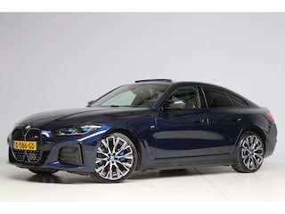 BMW i4 M50 M-sport | schuifkanteldak | adap. cruise | head-up | 360 camera | harmankardon | elek. trekhaak | keyless entry | 544PK