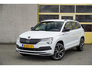 Skoda Karoq 1.5 TSI ACT 150PK! Automaat Sportline Business BJ2021 Lmv 19" | Led V+A | Pdc | Navi | Keyless entry | Elek. achterklep | Achteruitrijcamera | App-Connect | Virtual cockpit | Canton audio | | Sportstoelen | Verwarmde voorstoelen/stuurwiel | Zwarte hemel