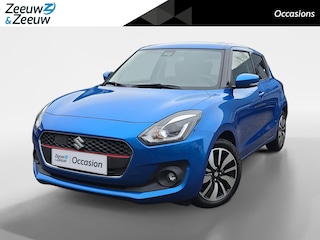 Suzuki Swift 1.0 Stijl | Trekhaak | Achteruitrijcamera | Navigatie | Stoelverwarming | Cruise control | 12 maanden garantie |
