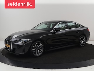 BMW 420i Edition Plus | Trekhaak | Stoelverwarming | Memory | Carplay | Leder | Navigatie | Camera | Achterbankverwarming | Keyless | Full LED | Sportstoelen