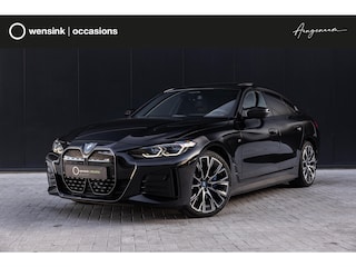 BMW i4 M50 High Executive 84 kWh | SOH 98,8% | M-Sport | Panoramadak | Sportstoelen | Harman/Kardon | X-Drive | Widescreen | Adaptief Onderstel | DAB | Stoel/stuurverwarming | Trekhaak | Laserlicht |