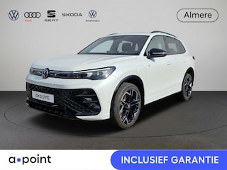 Volkswagen Tiguan 1.5 eHybrid R-Line Edition 272 pk Automaat (DSG) | Navigatie | Panoramadak | Parkeersensoren (Park assist) | Rondomzichtcamera | Lederen bekleding | Stoelverwarming v/a | Black Style pakket | R-Line |