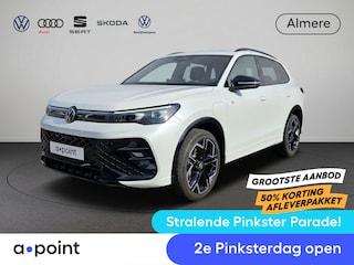 Volkswagen Tiguan 1.5 eHybrid R-Line Edition 272 pk Automaat (DSG) | Navigatie | Panoramadak | Parkeersensoren (Park assist) | Rondomzichtcamera | Lederen bekleding | Stoelverwarming v/a | Black Style pakket | R-Line |