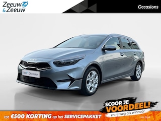 Kia Ceed Sportswagon 1.5 T-GDi DynamicLine | All-Seasonbanden | Apple Carplay / Android Auto | Navigatiesysteem | Parkeersensoren Voor + Achter | Parkeercamera Achter | Licht + Regensensor | Cruise Control | Climate Control | 16"Lichtmetalen velgen