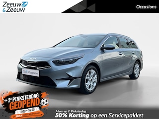 Kia Ceed Sportswagon 1.5 T-GDi DynamicLine | All-Seasonbanden | Apple Carplay / Android Auto | Navigatiesysteem | Parkeersensoren Voor + Achter | Parkeercamera Achter | Licht + Regensensor | Cruise Control | Climate Control | 16"Lichtmetalen velgen