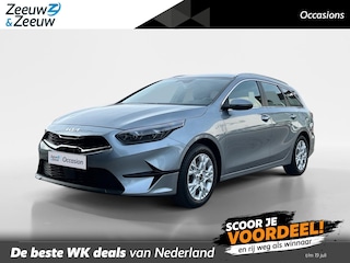 Kia Ceed Sportswagon 1.5 T-GDi DynamicLine | All-Seasonbanden | Apple Carplay / Android Auto | Navigatiesysteem | Parkeersensoren Voor + Achter | Parkeercamera Achter | Licht + Regensensor | Cruise Control | Climate Control | 16"Lichtmetalen velgen