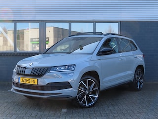 Skoda Karoq 1.5 TSI ACT Sportline Business DSG | pano dak | wegklapbare trekhaak | groot navi | voorstoelen + achterbank verwarmd | voorrruitverwarming
