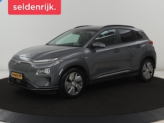 Hyundai Kona EV Premium 64 kWh | SOH 100% | 3 Fase | Stoelventilatie | Leder | Head-Up | Warmtepomp | Camera | Achterbankverwarming | Carplay | Navigatie | Adaptive cruise | Keyless | Parkeerhulp