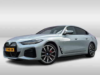 BMW i4 eDrive40 High Executive 84 kWh / Trekhaak / 360Camera / Head-up / Leder / 19'' / Navigatie / Stoelverwarming / DAB / Cruise Control