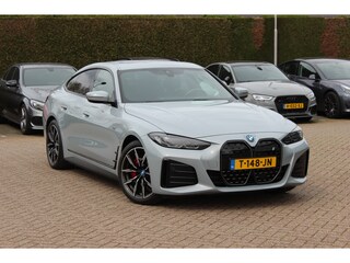 BMW i4 eDrive40 High Executive 84 kWh / Trekhaak / 360Camera / Head-up / Leder / 19'' / Navigatie / Stoelverwarming / DAB / Cruise Control