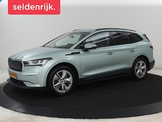 Skoda Enyaq iV 60 | SOH 91% | Trekhaak | Stoelverwarming | Camera | Sportstuur | Carplay | Navigatie | Cruise control | Full LED | Half leder | DAB | Parkeerhulp | Sfeerverlichting | Climate control
