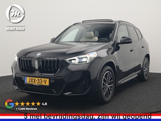 BMW X1 sDrive20i M Sport 170pk Dealer O.H. | Panodak | Lederen Sportstoelen Verwarmd | Adaptive M Onderstel | Widescreen Navi | Camera | Keyless | Adaptive LED | Sfeerverlichting | Apple Carplay | Navigatie | DAB |