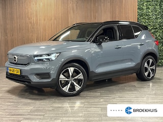 Volvo XC40 Recharge 70 kWh | All Season Banden | 95% SoH | Stoel en Stuurwielverwarming | Parkeercamera | Leder alcantara R-Design bekleding met wit stiksel en bies | Zitting verlenging voorstoelen | Warmtepomp | 19 Inch | Google Infotainment | Keyless Drive | Parkeersensoren voor+achter | Elektrisch bedienbare achterklep | Apple Carplay/Android Auto | Alarm Klasse III | Draadloos telefoon opladen | Volvo On Call met mobiele App functie | Thunder Grey Metallic |