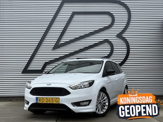 Ford Focus Wagon 1.0 Titanium 2e Eigenaar|Navi|Trekhaak|Clima|Cruise|PDC V+A|N.A.P|APK tot 07-2026
