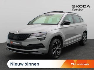 Skoda Karoq 1.5 TSI ACT Sportline Business 150PK DSG Pano-Schuifdak, Trekhaak, Canton Audio, Side Assist, Achteruitrijcamera, Elektr. Achterklep, Keyless, 19" LM Velgen