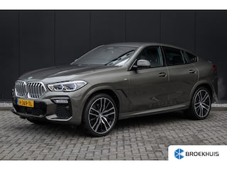 BMW X6 xDrive40i High Executive HUD | H&K | Pano | Luchtvering | 360 Camera | Stuurverwarming | Memory seats | Trekhaak | Adapt. Cruise Control + Zelfsturende functie
