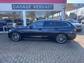 BMW 3-serie Touring 330e High Executive
