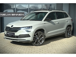 Skoda Karoq 1.5 TSI ACT Sportline Business | Panoramadak | Stoelverwarming | Stuurverwarming | Canton | Keyless | Apple Carplay | Camera | Adaptive Cruise Control | Dodehoekdetectie