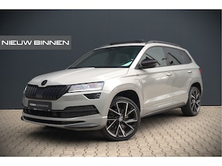 Skoda Karoq 1.5 TSI ACT Sportline Business | Panoramadak | Stoelverwarming | Stuurverwarming | Canton | Keyless | Apple Carplay | Camera | Adaptive Cruise Control | Dodehoekdetectie