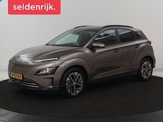 Hyundai Kona EV Fashion 64 kWh | SOH 100% | 3 Fase | Head-Up | Warmtepomp | Adaptive cruise | Camera | Carplay | Keyless | Full LED | Navigatie | Climate control