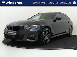 BMW 3-serie Touring 330e xDrive High Executive | Stoel en Stuurverwaming  | M-Sport | Elektrische Achterklep | Camera |