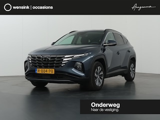 Hyundai Tucson 1.6 T-GDI HEV Comfort | Trekhaak | Adaptieve Cruise Control | Stoelverwarming | Climate Control | Apple CarPlay | Camera | Navigatie | NL Auto |