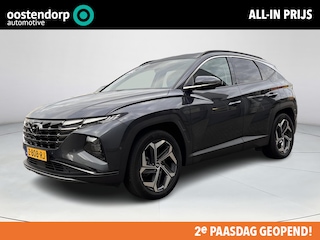 Hyundai Tucson 1.6 T-GDI PHEV Premium 4WD | Lederen bekleding | Stoel- en stuurverwarming | 4WD | Navigatiesysteem | Climate Control | Adaptieve Cruise Control | Plug Inn hybride | Full options | Resterende fabrieksgarantie | Rijklaarprijs |