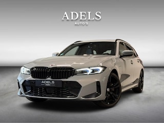 BMW 3-serie Touring 330e xDrive M Sport Panodak HUD Trekhaak Harman Kardon Camera ACC Brooklyngrau