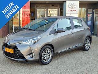 Toyota Yaris 1.5 Hybrid EXECUTIVE TREKHAAK NAVI CAMERA CRUISE BLUETOOTH CLIMA LM-VELGEN PRIVACY GLASS NL-AUTO 1E-EIG