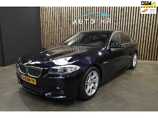 BMW 520i M pakket digital dash sportstoelen trekhaak
