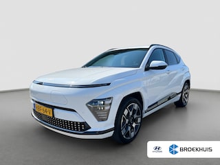 Hyundai Kona Comfort Smart 65.4 kWh | Camera | Carplay draadloos | Climate control | Adaptive cruise control | Elektrische achterklep | Full LED koplampen | Stuurverwarming | Stoelverwarming | Navigatie | 19'' Velgen