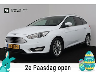 Ford Focus Wagon 1.0 First Edition (NAVIGATIE, STOELVERWARMING, PDC, VOORRUITVERWARMING, PARKEERHULP)