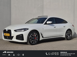BMW i4 eDrive35 M Sport Edition 70 kWh Automaat / Accu SOH 100% / CCS snellader / Dealer onderhouden / Wide Screen display / Schuifdak / Parkeerassistent pakket / Hifi en DAB / Trekgewicht 1600 kg / Voorstoelen verwarmd / Apple Carplay Android Auto /