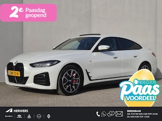 BMW i4 eDrive35 M Sport Edition 70 kWh Automaat / Accu SOH 100% / CCS snellader / Dealer onderhouden / Wide Screen display / Schuifdak / Parkeerassistent pakket / Hifi en DAB / Trekgewicht 1600 kg / Voorstoelen verwarmd / Apple Carplay Android Auto /