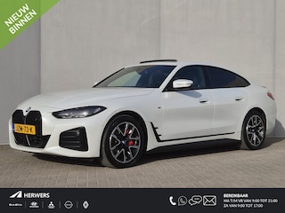 BMW i4 eDrive35 M Sport Edition 70 kWh Automaat / Accu SOH 100% / CCS snellader / Dealer onderhouden / Wide Screen display / Schuifdak / Parkeerassistent pakket / Hifi en DAB / Trekgewicht 1600 kg / Voorstoelen verwarmd / Apple Carplay Android Auto /