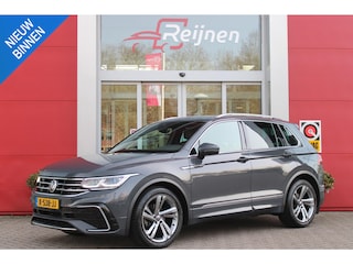Volkswagen Tiguan 1.5 TSI 150PK R-Line Business+ | LED MATRIX KOPLAMPEN (IQ LIGHT) | NAVIGATIE | R-LINE INTERIEUR/EXTERIEUR | VERWARMBARE VOORSTOELEN | BEKLEDING LEDER VIENNA | AKOESTISCH GLAS GETINT | KEYLESS ACCESS/START | ELEKTRISCH BEDIENABRE ACHTERKLEP | DAKSPOILER R-LINE | APPLE CARPLAY/ANDROID AUTO | DAB+ RADIO | DRAADLOZE TELEFOONLADER | DIGITAAL DASHBOARD | CLIMA CONTROL VOOR EN ACHTERIN |