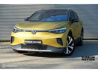 Volkswagen ID.4 First 77 kWh | LED | Camera | Trekhaak | CarPlay | Stoel en stuurwielverw. | Lage km | Rijklaar | Nieuwstaat
