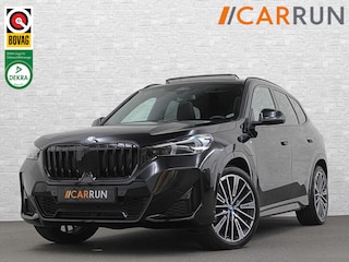 BMW X1 30e 313PK M-Sport | 360 Camera | ACC | Panorama | Head-Up | 20'' | Keyless-Entry | LED Adaptief | Sfeerverlichting | Trekhaak 1800kg | Sportstoelen | Carplay | Black-Optic | Getint Glas | Stoelverwarming | DAB | Draadloos Laden | Fabrieksgarantie |