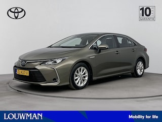 Toyota Corolla 1.8 Hybrid Active Navi | 16'' Lichtmetalen velgen | Metaalkleur | Parkeercamera | NL-Auto |