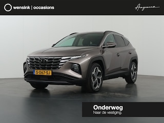 Hyundai Tucson 1.6 T-GDI HEV Premium | Trekhaak | Lederen bekleding | Ele.verstelbare stoelen + geheugen | Stoel/Stuur verwarming | Navigatie | DAB | 360 Camera | Apple CarPlay/Android Auto | Stoelkoeling | Adaptieve Cruise Control | Krell Audio |