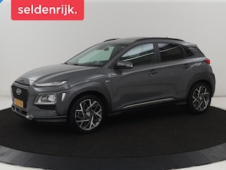 Hyundai Kona 1.6 GDI HEV Premium Sky | Schuifdak | Leder | Stoelventilatie | Adaptive cruise | Trekhaak | Head-Up | Carplay | Camera | Achterbankverwarming | Navigatie | Keyless | Climate control