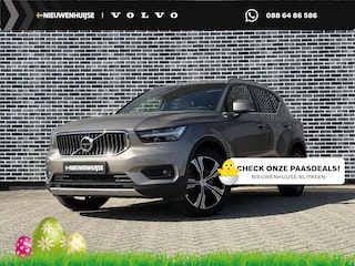 Volvo XC40 Plug-in Hybrid T5 Inscription | Trekhaak | Panoramadak | Adaptive cruise control | Lederen bekleding | Harman Kardon audio | 360 camera | Elektrische stoelverstelling | Stoel- en stuurverwarming | Actieve LED koplampen | Standkachel | Getint glas | Verwarmbare achterbank | Navigatie | Apple Carplay / Android Auto |