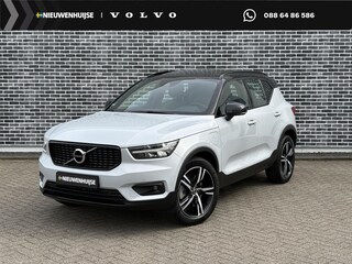 Volvo XC40 1.5 T4 Recharge R-Design Expression | Plug-in Hybrid (PHEV) | Panoramadak | Trekhaak | Lichtmetalen Velgen 19 inch | Achteruitrijcamera | Elektrische Achterklep | Keyless Entry | Navigatie | Apple Carplay | Android Auto | Cruise Control Adaptief