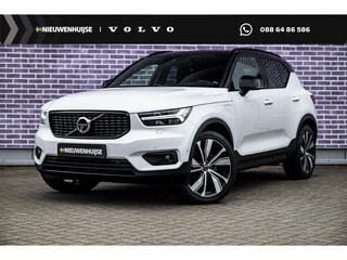 Volvo XC40 Plug-in Hybrid T5 R-Design | Trekhaak | Panoramadak | 20 inch velgen | 360 camera | Stoel- en stuurverwarming | Harman Kardon audio | Verwarmbare voorruit | Adaptive cruise control | Actieve LED koplampen | Elektrische stoelverstelling | Getint glas | Navigatie | Apple Carplay / Android Auto | Draadloze telefoonlader | LED mistlampen |