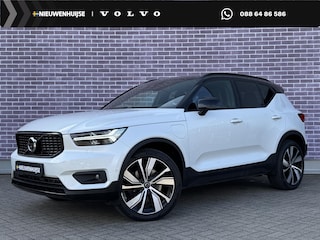 Volvo XC40 Plug-in Hybrid T5 R-Design | Trekhaak | Panoramadak | 20 inch velgen | 360 camera | Stoel- en stuurverwarming | Harman Kardon audio | Verwarmbare voorruit | Adaptive cruise control | Actieve LED koplampen | Elektrische stoelverstelling | Getint glas | Navigatie | Apple Carplay / Android Auto | Draadloze telefoonlader | LED mistlampen |