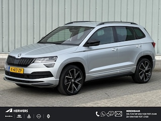 Skoda Karoq 1.5 TSI ACT Sportline Business / Nederlandse Auto / Dealer Onderhouden / All Seasonbanden / Trekhaak 1500 KG / Navigatie / Stoel- en Stuurverwarming / Adaptive Cruise Control / Voorruitverwarming / Climate Control /