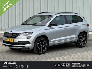 Skoda Karoq 1.5 TSI ACT Sportline Business / Nederlandse Auto / Dealer Onderhouden / All Seasonbanden / Trekhaak 1500 KG / Navigatie / Stoel- en Stuurverwarming / Adaptive Cruise Control / Voorruitverwarming / Climate Control /