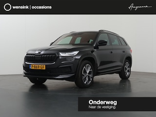 Skoda Kodiaq 1.5 TSI Sportline Business 7p. | Sportstoelen | Lederen Interieur | Navigatie | Ele.verstelbare stoelen + geheugen | Live Cockpit | DAB | Apple CarPlay/Android Auto | Camera | Stoel/Stuurverwarming | Adaptieve Cruise Control | Trekhaak Wegklapbaar |